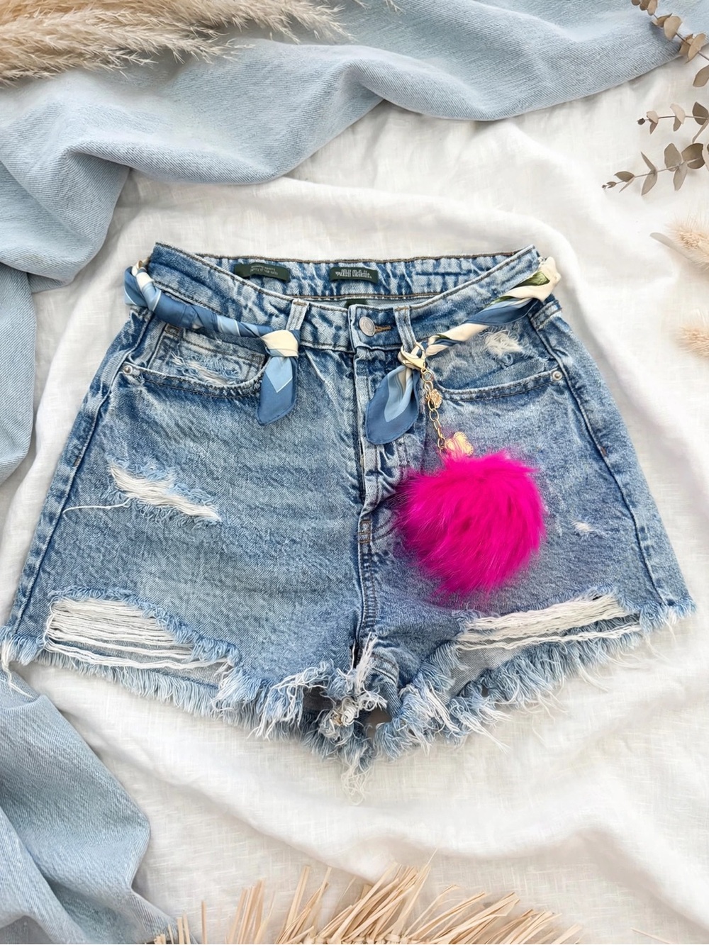 Target Light Blue Distressed Denim Shorts with Fuchsia Pom Charm